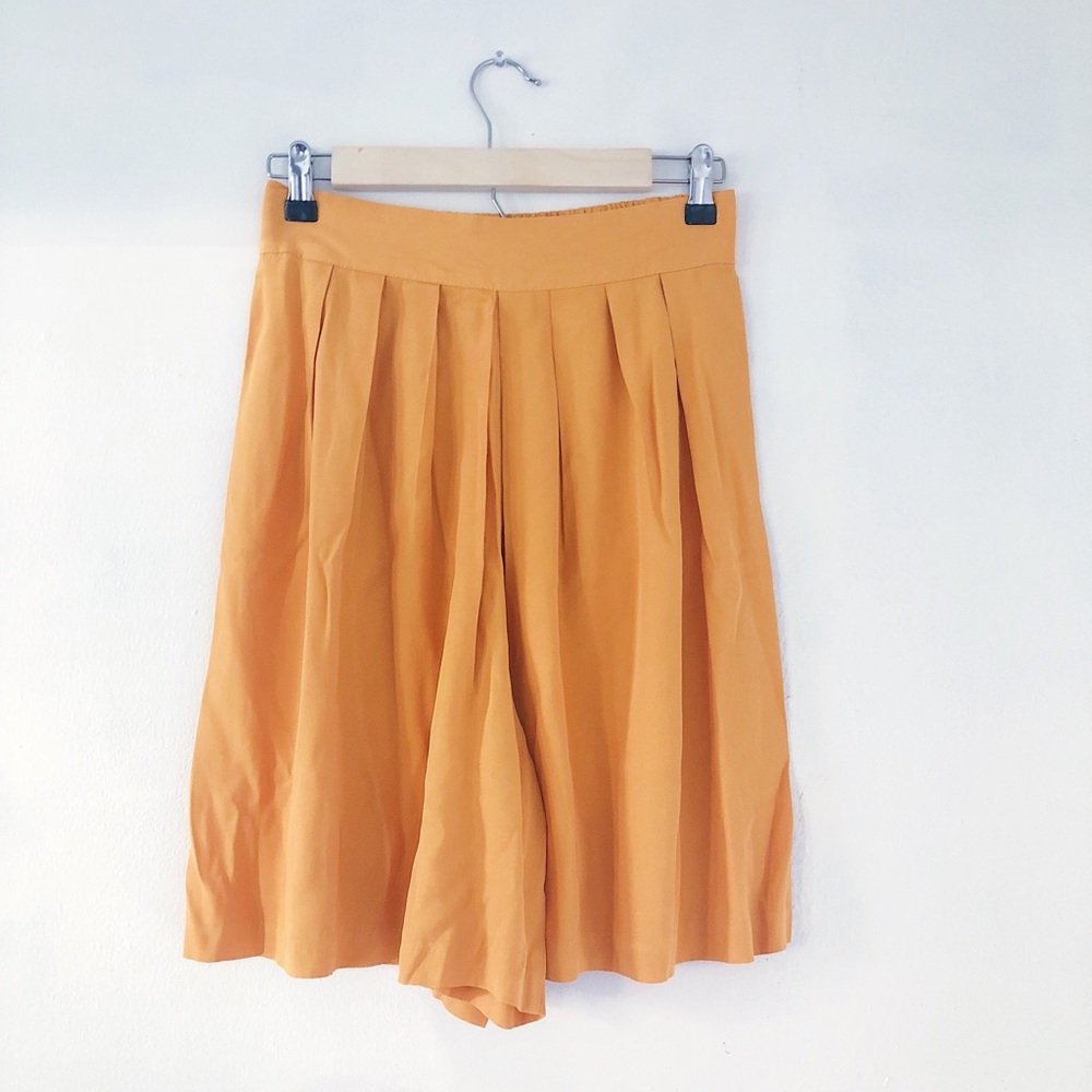 Bright yellow vintage high waisted shorts